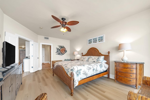 28107 Perdido Beach Blvd Unit D1005, Orange Beach, AL 36561 - bedroom featuring light wood-style floors and a ceiling fan