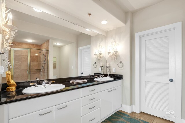 28107 Perdido Beach Blvd Unit D1005, Orange Beach, AL 36561 - full bathroom with double vanity, a stall shower, tile patterned flooring, and recessed lighting