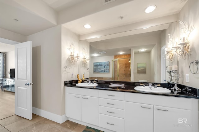 28107 Perdido Beach Blvd Unit D1005, Orange Beach, AL 36561 - bathroom featuring double vanity, a shower stall, tile patterned floors, and recessed lighting