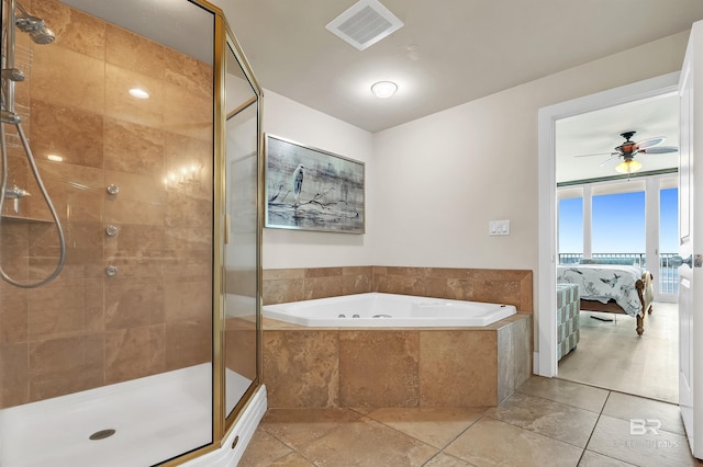 28107 Perdido Beach Blvd Unit D1005, Orange Beach, AL 36561 - bathroom featuring connected bathroom, a stall shower, a bath, and a ceiling fan