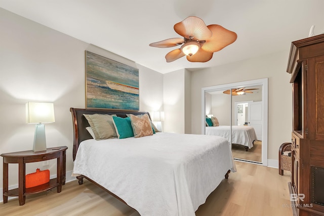 28107 Perdido Beach Blvd Unit D1005, Orange Beach, AL 36561 - bedroom with light wood-type flooring and a ceiling fan