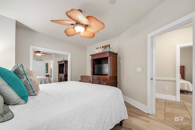 28107 Perdido Beach Blvd Unit D1005, Orange Beach, AL 36561 - bedroom featuring light wood-style flooring and ceiling fan
