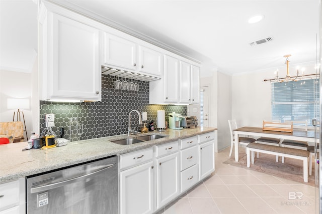 kitchen featuring decorative backsplash, white cabinets, light stone counters, sink, and dishwasher