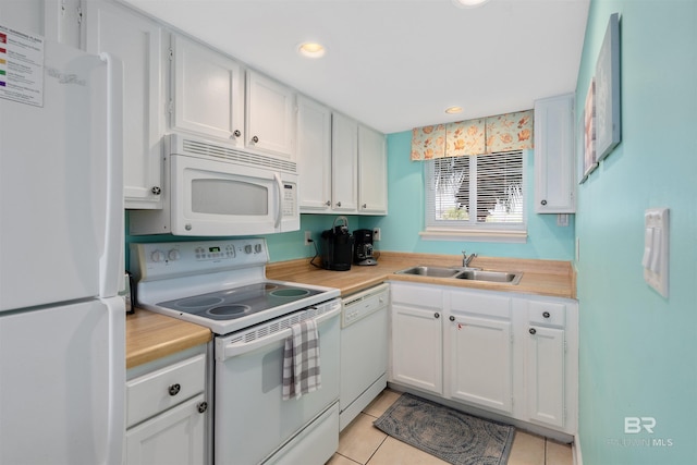 615 W Beach Blvd Unit 1E, Gulf Shores, AL 36542 - kitchen featuring white appliances, a sink, light countertops, white cabinets, and recessed lighting