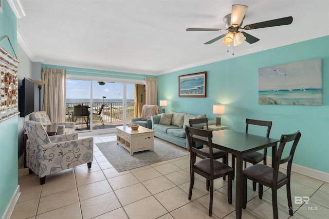 615 W Beach Blvd Unit 1E, Gulf Shores, AL 36542 - living area with ornamental molding, light tile patterned floors, a ceiling fan, and baseboards