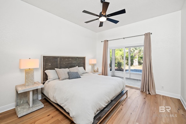 bedroom featuring ceiling fan, access to exterior, and light hardwood / wood-style flooring