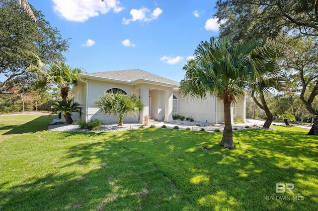 view of front of property with a front lawn