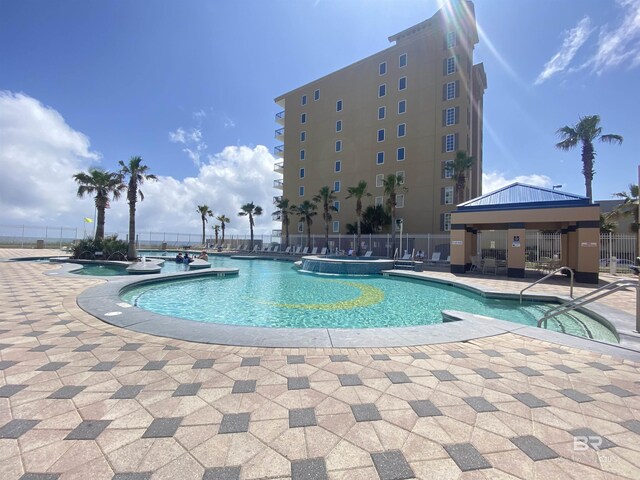 1010 W Beach Blvd Unit 209, Gulf Shores, AL 36542 - community pool with a patio