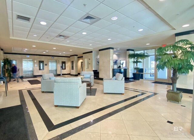 1010 W Beach Blvd Unit 209, Gulf Shores, AL 36542 - lobby featuring a drop ceiling and recessed lighting