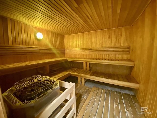 1010 W Beach Blvd Unit 209, Gulf Shores, AL 36542 - relaxing sauna featuring wood walls, wood ceiling, and hardwood / wood-style floors