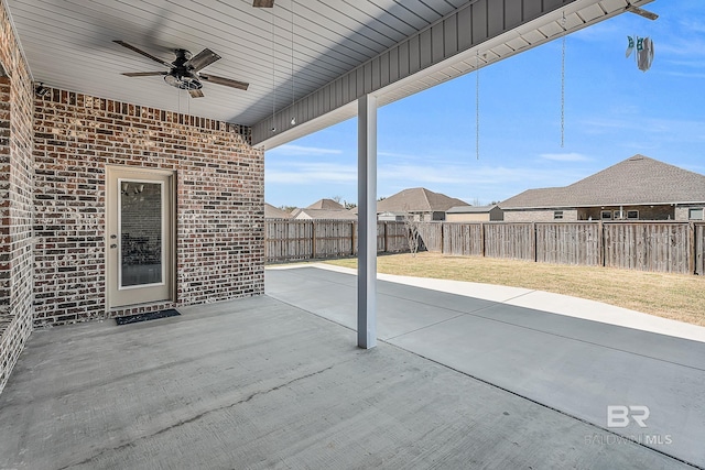 view of patio with a ceiling fan and a fenced backyard