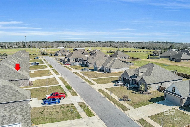 drone / aerial view with a residential view