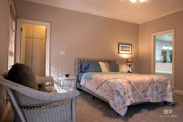 carpeted bedroom with ornamental molding, ceiling fan, and ensuite bathroom