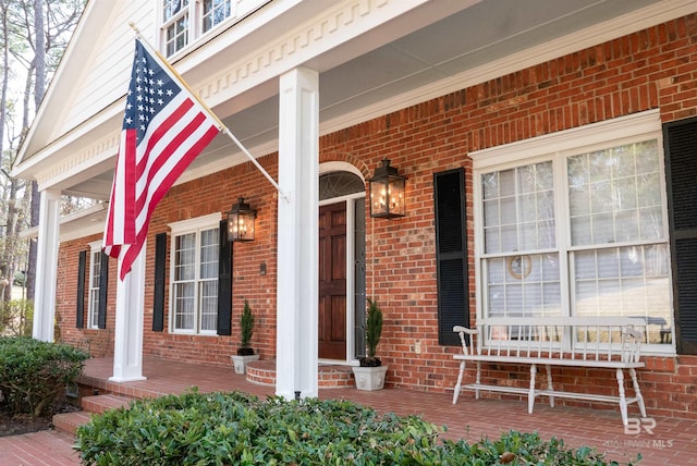 doorway to property with a porch