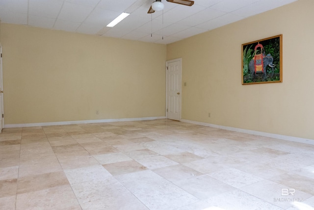 unfurnished room featuring ceiling fan