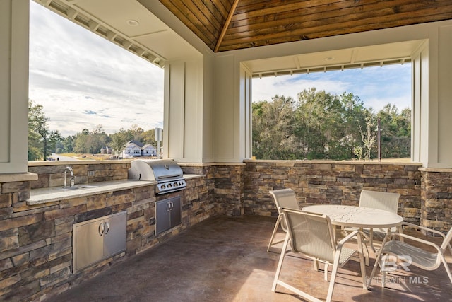 view of patio featuring grilling area, area for grilling, and sink