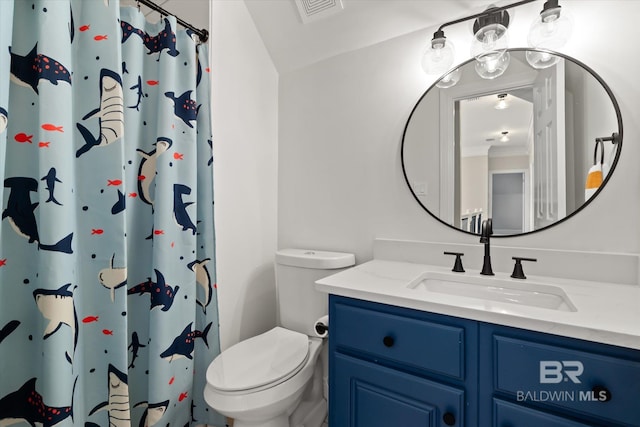 bathroom with a shower with curtain, vanity, and toilet