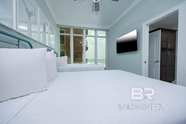 bedroom with crown molding, ceiling fan, and access to exterior