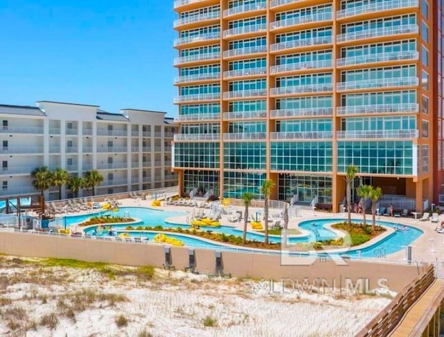 surrounding community featuring a swimming pool