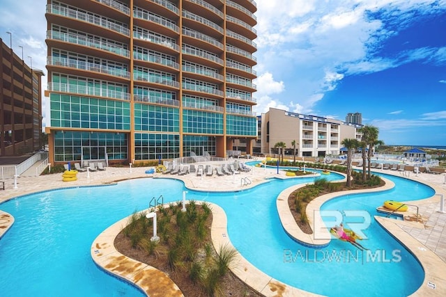 pool with a patio