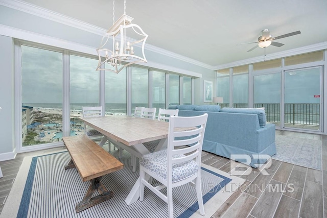sunroom with a chandelier