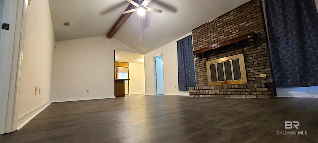 unfurnished living room with ceiling fan, a brick fireplace, vaulted ceiling with beams, and dark wood-type flooring