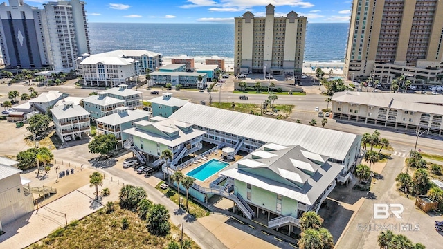 drone / aerial view with a water view and a city view