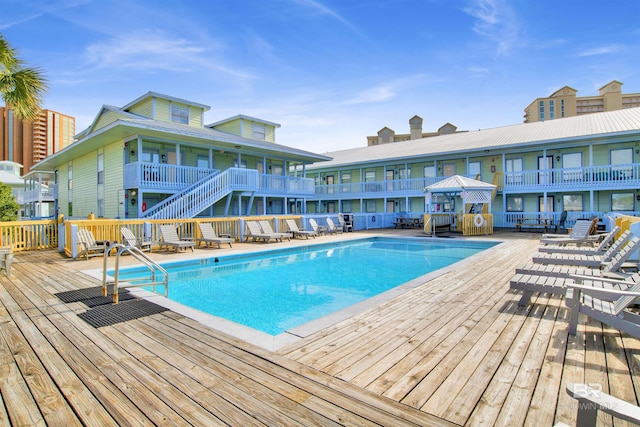 outdoor pool with a deck