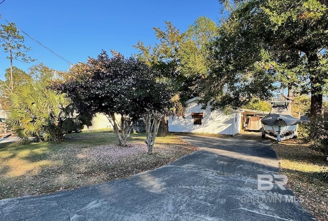 view of property hidden behind natural elements