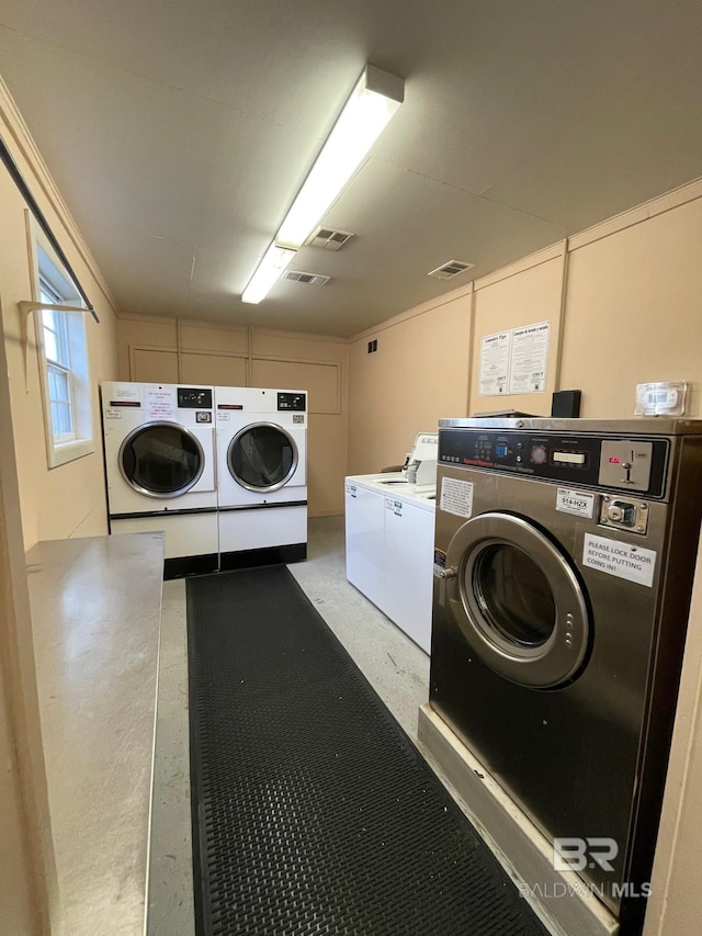 laundry room featuring washer and dryer