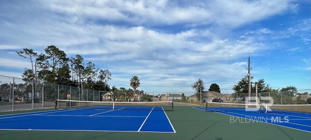 view of tennis court with basketball court