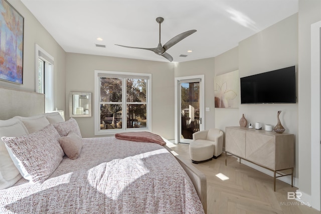 bedroom with light parquet flooring, access to outside, and ceiling fan