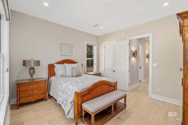 bedroom featuring light wood-type flooring