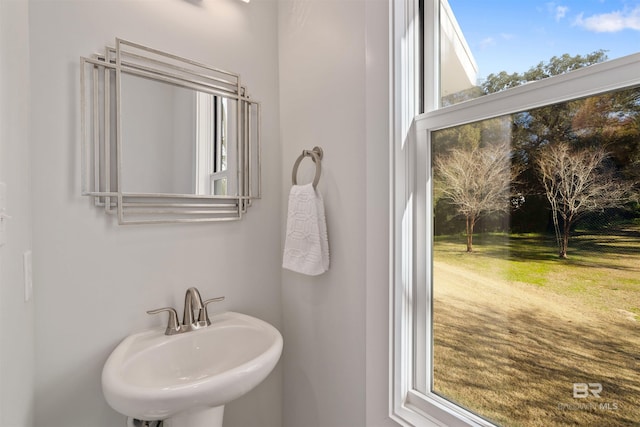 bathroom with a healthy amount of sunlight and sink