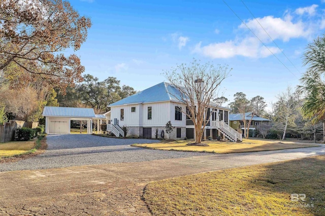 view of front facade with a carport