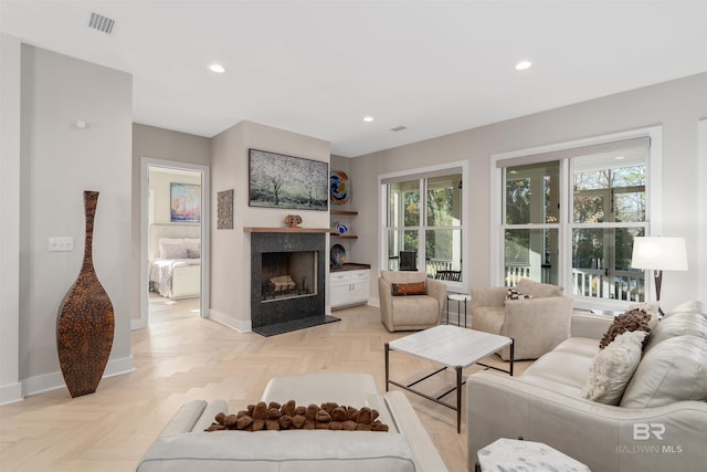 living room with light parquet floors