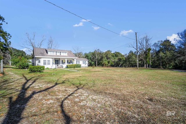 view of yard with a porch