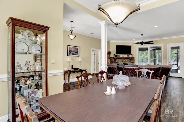 5698 Spring Landing Dr, Theodore, AL 36582 - dining room with decorative columns, ornamental molding, ceiling fan, dark wood-type flooring, and recessed lighting