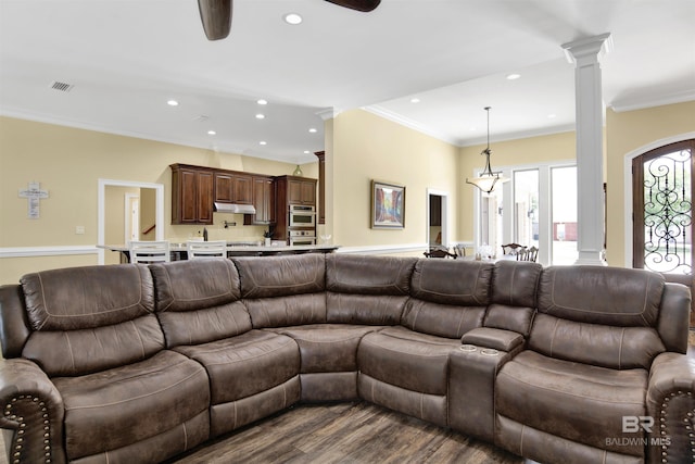 5698 Spring Landing Dr, Theodore, AL 36582 - living room featuring ornate columns, ceiling fan, recessed lighting, crown molding, and dark wood finished floors