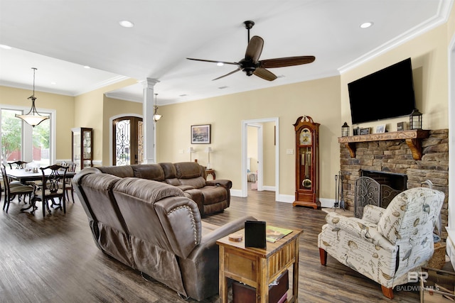 5698 Spring Landing Dr, Theodore, AL 36582 - living room featuring crown molding, recessed lighting, dark wood-style flooring, a fireplace, and a ceiling fan