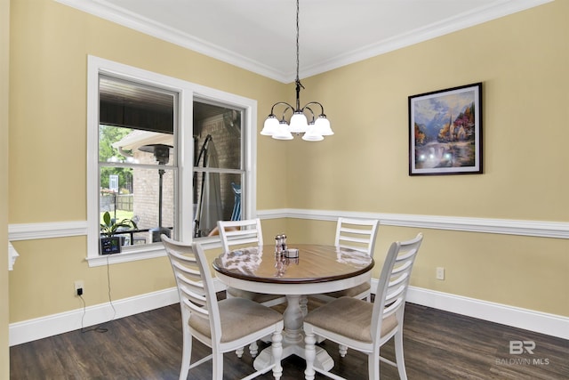 5698 Spring Landing Dr, Theodore, AL 36582 - dining area with a chandelier, wood finished floors, and crown molding