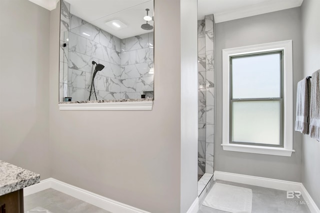 5698 Spring Landing Dr, Theodore, AL 36582 - full bathroom featuring vanity and a marble finish shower
