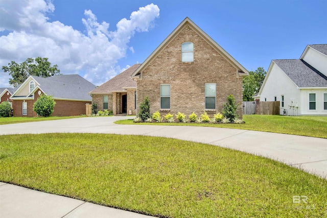 5698 Spring Landing Dr, Theodore, AL 36582 - view of front of house featuring brick siding and curved driveway