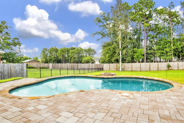 5698 Spring Landing Dr, Theodore, AL 36582 - view of pool featuring a patio, a fenced backyard, and an outdoor fire pit