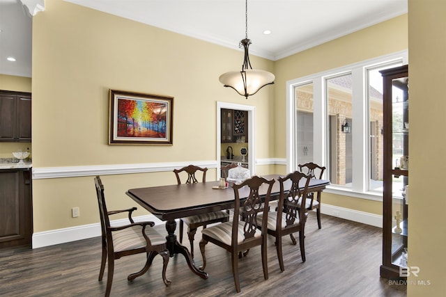 5698 Spring Landing Dr, Theodore, AL 36582 - dining space with dark wood finished floors, recessed lighting, and crown molding