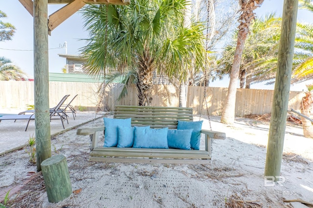 684 Chickasaw Rd, Gulf Shores, AL 36542 - fenced backyard with a patio