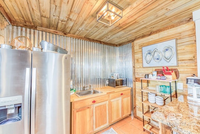 684 Chickasaw Rd, Gulf Shores, AL 36542 - kitchen with stainless steel fridge with ice dispenser, butcher block counters, wooden ceiling, light tile patterned flooring, and light brown cabinets