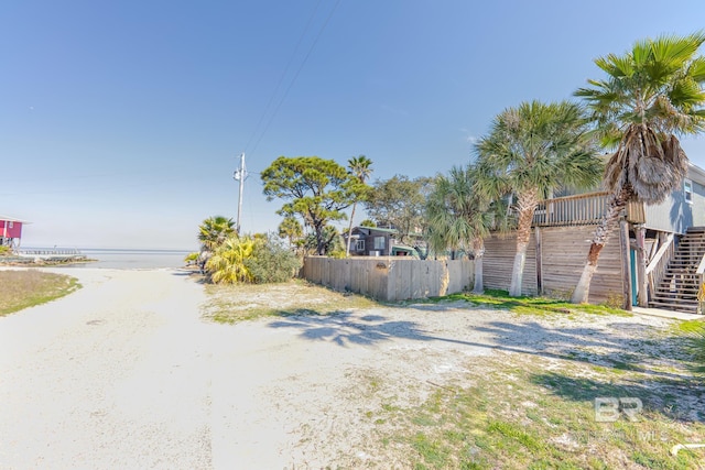 684 Chickasaw Rd, Gulf Shores, AL 36542 - view of street featuring stairs