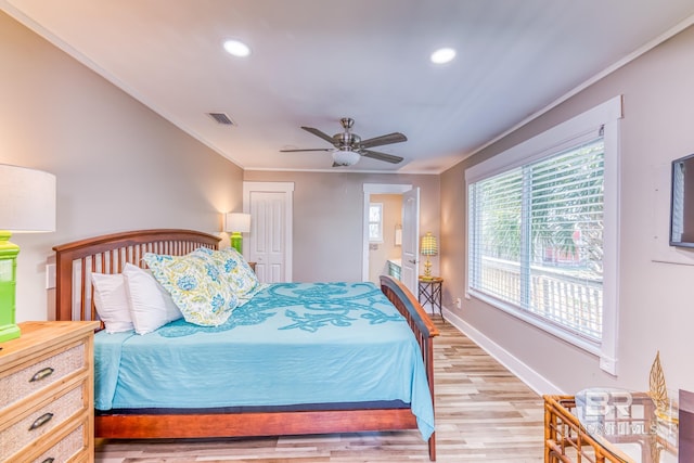 684 Chickasaw Rd, Gulf Shores, AL 36542 - bedroom featuring light wood-style flooring, recessed lighting, ornamental molding, and ceiling fan