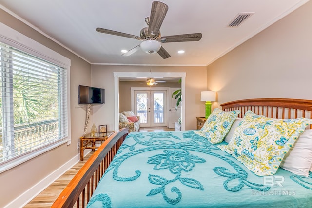 684 Chickasaw Rd, Gulf Shores, AL 36542 - bedroom with access to outside, light wood-style floors, recessed lighting, a ceiling fan, and crown molding